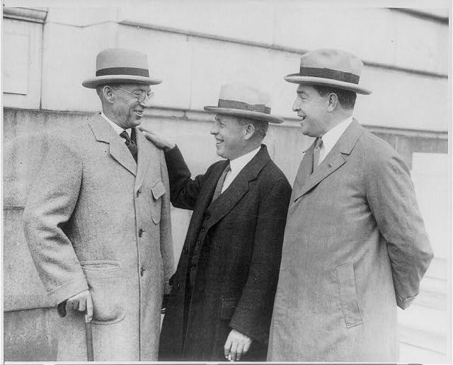 Lincoln C. Andrews, Emery C. Ruckner and John Philip Hill standing outside the Capitol.