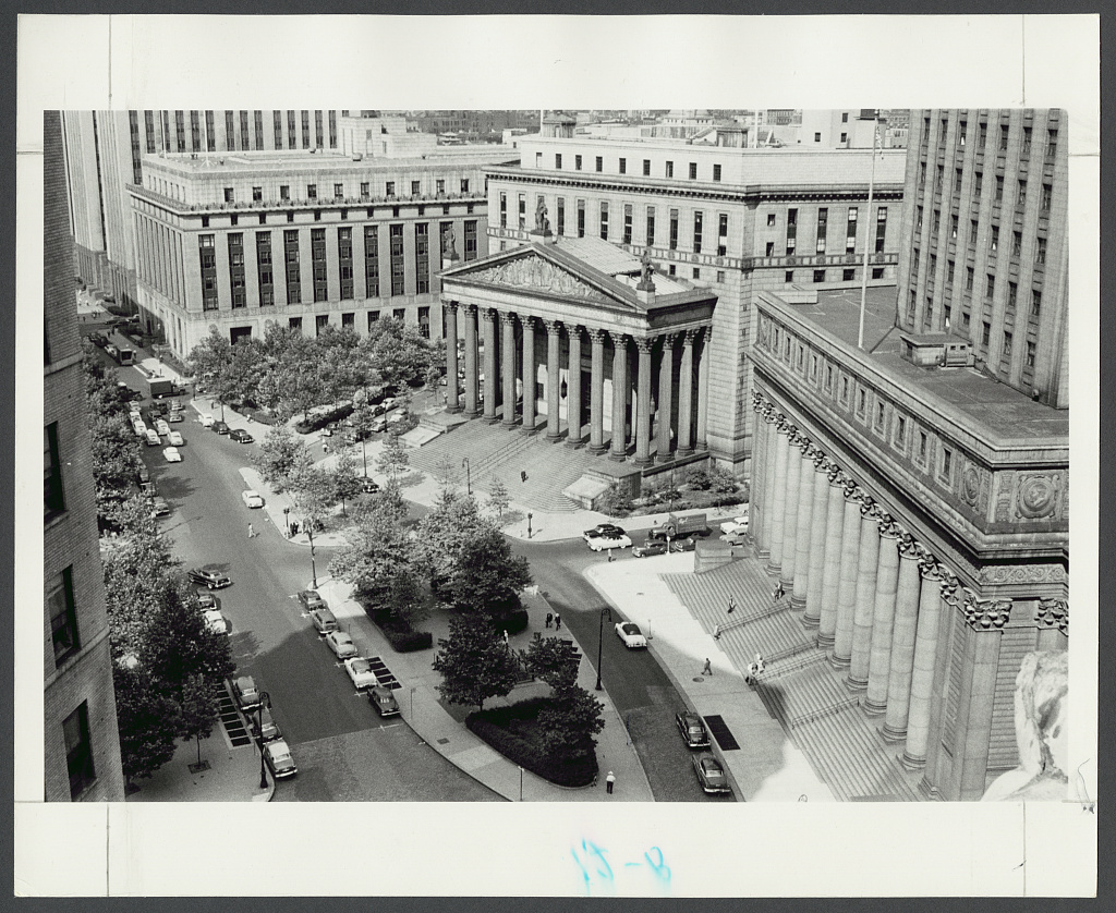Aerial view of two courthouse buildings and the streets around Foley Square in New York.