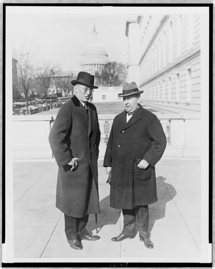 Lincoln C. Andrews and Roy C. Haynes standing outside the House of Representatives.