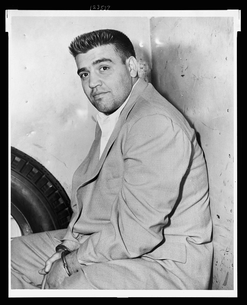 Three-quarter-length photograph of Vincent Gigante seated, facing the camera.