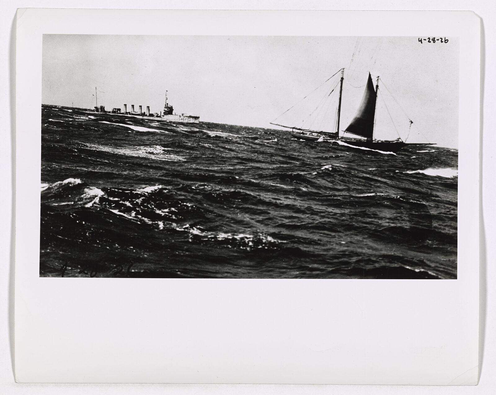 A four-stack Coast Guard destroyer at sea.