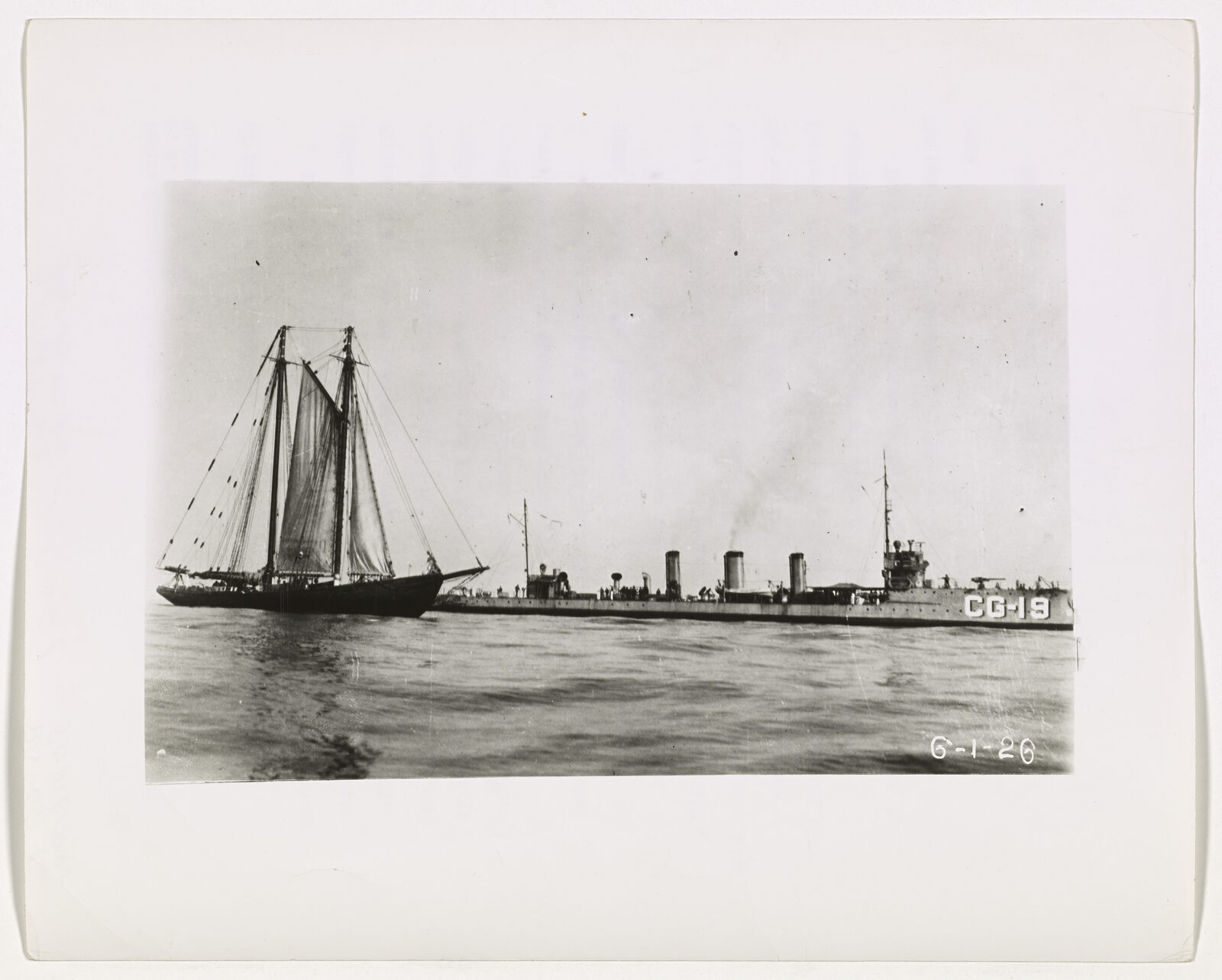 The Coast Guard destroyer TERRY at sea in pursuit of a vessel.
