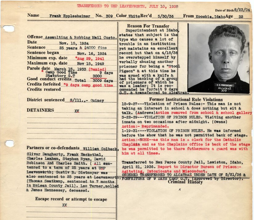 Alcatraz warden's notebook form headed Transferred to USP Leavenworth, July 10, 1938, typed for Frank Epplesheimer, No. 309, with an identification photograph at upper right of a fair-haired man holding a placard reading U.S. Penitentiary Alcatraz 309, typed commitment details at left, and remarks in black and red type at right